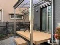 屋根付きウッドデッキで家事空間と寛ぎの空間を両立した工事