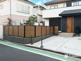 駐車スペースを家族の庭へ変えるフェンス付き外構リフォーム工事