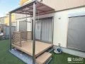 テラス屋根とウッドデッキでくつろぎ時間を広げたお庭工事