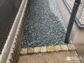 沈下していたコンクリートの犬走りを砂利で整えたリフォーム工事