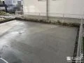 土間コンクリートと青砕石で整えた駐車スペースと犬走り工事