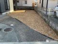 曲線の映える駐車スペースと蛍里石で整えたお庭リフォーム工事