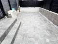 石調タイルの深みが魅せる、主庭のプライベートテラス