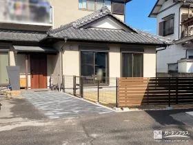 ナチュラルな風合いの天然芝敷きドッグランを備えた外構工事