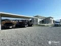 3台用カーポートと広々デッキ。開放感も楽しむ新築外構