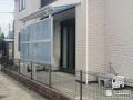 雨の日も安心して使えるテラス屋根とコンクリートのお庭工事