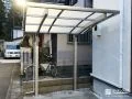 優しくカーブを描く屋根で自転車を守るサイクルポート工事