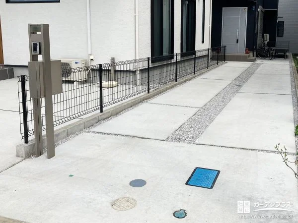 土間コンクリートとウッドデッキで整えるシンプル外構工事