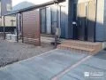 掃き出し窓前へ入る視線を遮り快適に整えた外構リフォーム工事