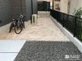 ピンコロ石を見切りに用い可愛らしく砂利の飛び出しを防止