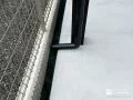 スリットに排水が流れ込むように設置したカーポートの雨樋