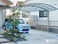 優しいカーブを描く屋根でお車を守るカーポート