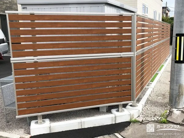 木調フェンスと物置でプライバシーと収納を確保した外構工事