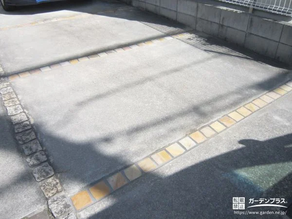 タマリュウを撤去しピンコロ石を入れた駐車スペースの目地工事