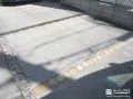 タマリュウを撤去しピンコロ石を入れた駐車スペースの目地工事
