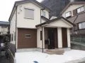 ウッドデッキと芝生でくつろげるお庭空間と駐車スペース工事