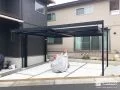 吊り下げ式のカーポートで開放感を高めた駐車スペース工事