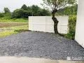 駐車スペースに砂利を敷設し水はけの良い地面に整えた工事