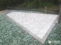 乱形石のテラス空間とグリーンの化粧砂利がおしゃれなお庭工事