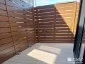 ウッドデッキの周りをフェンスでしっかり囲んだ快適空間工事