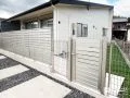 愛犬との暮らしを見据えた人工芝とタイルデッキ付きのドッグラン工事