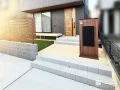 天然石のような質感が玄関まわりを明るく見せるアプローチ