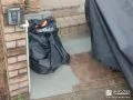 花壇を撤去しコンクリートを打つことで空間を有効活用した工事