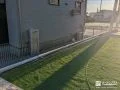 メッシュフェンスで境界を区切ったお庭