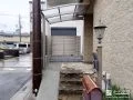 屋根付きで雨の日も通行しやすくスロープもついた玄関周り工事
