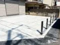 土間コンクリートで広々使いやすい、防犯性を高めた角地の新築外構