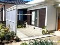 前面スクリーン付きテラス屋根で洗濯物を守る空間づくり