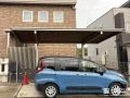木調デザインのカーポートが外観を引き立てる駐車スペース工事