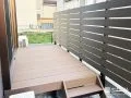 タイルデッキの代わりに選んだ、くつろぎやすいウッドデッキ空間