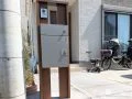 宅配ボックス付きの木目調機能門柱設置で使いやすい玄関前工事