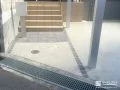 平板の舗装とピンコロ石で上質感を演出した玄関周りとお庭の工事