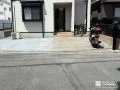 洗い出し仕上げのコンクリートで上品にまとめた駐車スペース工事
