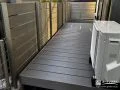 リビングと庭をつなぐ、くつろぎのウッドデッキ空間
