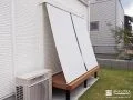 日差しを調節しながら快適に過ごせるシェードの設置をした工事