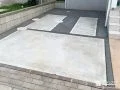 凹凸のあった駐車スペースの地面をコンクリートで整えた工事