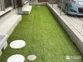 お手入れの負担を大きく軽減する防草シートと人工芝敷設工事