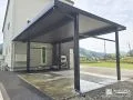 天井パネルに木目調を採用した上質なカーポート