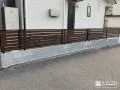 木目調フェンスとコンクリートで整えた暮らしやすい外構工事