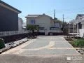 レンガでつくった曲線が美しく彩る駐車スペースのリフォーム工事