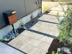 曲線アプローチと植栽が彩るシンプルモダンな新築外構工事