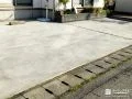 美しい仕上がりと高い耐久性を兼ね備えた広々駐車スペース工事