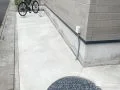 雑草対策と歩きやすさを両立した犬走りコンクリート舗装工事