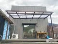 木目調でナチュラルなデザインのテラス屋根を設置した工事