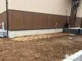 勝手口から続くレンガの園路