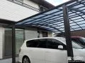 愛車を包む大きな屋根とフェンスで安心感を添える外構工事