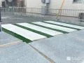 人工芝スリットで緑のリズムを添えた爽やかな駐車スペース
